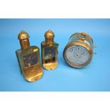 A Hateley's "Turners Patent" "The Homing Pigeon Clock" in a brass case, silvered dial; and a pair of