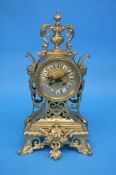 A French brass mantle clock by Michelant a Paris with enamelled Roman numerals, brass dial, 8 day