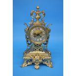 A French brass mantle clock by Michelant a Paris with enamelled Roman numerals, brass dial, 8 day