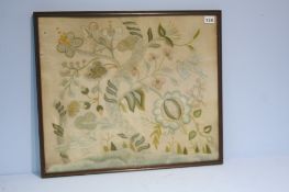 An early 20th century framed crewel work picture in the Arts and Crafts style.  46 cm x 53 cm