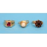 Three 9ct gold rings, a garnet cluster ring, a pearl set and a facet cut garnet.  Ring sizes M, M