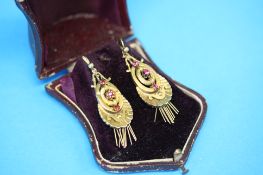 A pair of boxed Victorian yellow metal (15ct ?) ruby set tassel earrings.