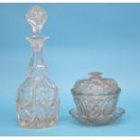 A Victorian cut glass decanter and a cut glass confiture and stand.