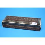 A rectangular carved wood box with rosewood travelling sewing case with marquetry decoration and