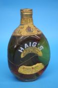 A bottle of Haig's Dimple Scotch Whisky.