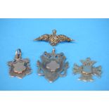 A 1940's silver marcasite RAF brooch, 2 silver fobs and a Persian silver fob. (4)