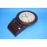 A Victorian rosewood cased circular wall clock with enamelled dial.  36 cm diameter, 52 cm length.