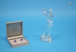A Baccarat clear glass figure of a Golfer and a pair of boxed Lalique 'Oxygene' cuff links.