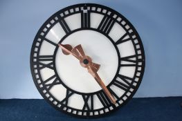 A large clock face with motion works.