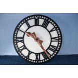 A large clock face with motion works.