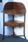 A Georgian mahogany corner washstand with single drawer.  61 cm wide