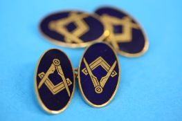 A pair of 9ct gold Masonic cuff links set with blue enamels, Birmingham 1970.  Weight 9.3 grams