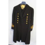 A Naval Officer's suit to include tunic, waistcoat, trousers, sash etc.