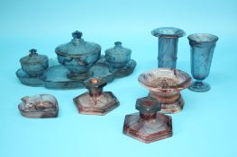 A Davidson blue cloud glass dressing table set, five purple candlesticks, three spill vases, a heart