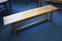 An oak and pine long bench.  147 cm long