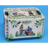 A Victorian pottery money box, each end decorated with cricketing batsmen, the top, front and back