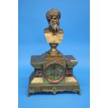 A 19th century brass mantle clock surmounted by a bust of a classical god below brass dial, 8 day