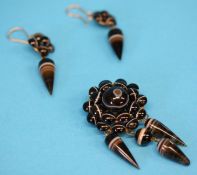 An agate set drop brooch and a matching pair of conical agate set earrings.
