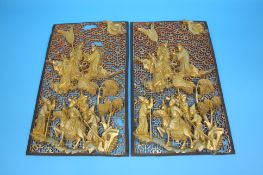 A pair of decorative oriental pierced fretwork panels.  55 cm high x 32 cm wide.