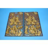 A pair of decorative oriental pierced fretwork panels.  55 cm high x 32 cm wide.