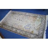 Three part silk rugs - A Tree of Life rug, the salmon pink ground bearing naturalistic animals and