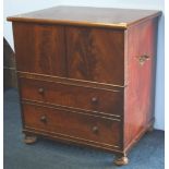 A Victorian mahogany fold over commode supported on turned feet.  66 cm wide