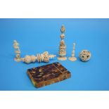 A small tortoiseshell calling card case and a quantity of carved ivory including a small