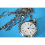 A Continental pocket watch and a silver and gold chain.  Weight 17.4 grams