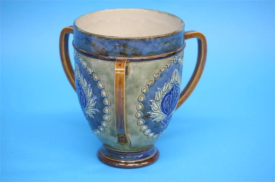 A Royal Doulton stoneware tyg decorated with three panels of stylised flowers, impressed marks, - Image 16 of 24