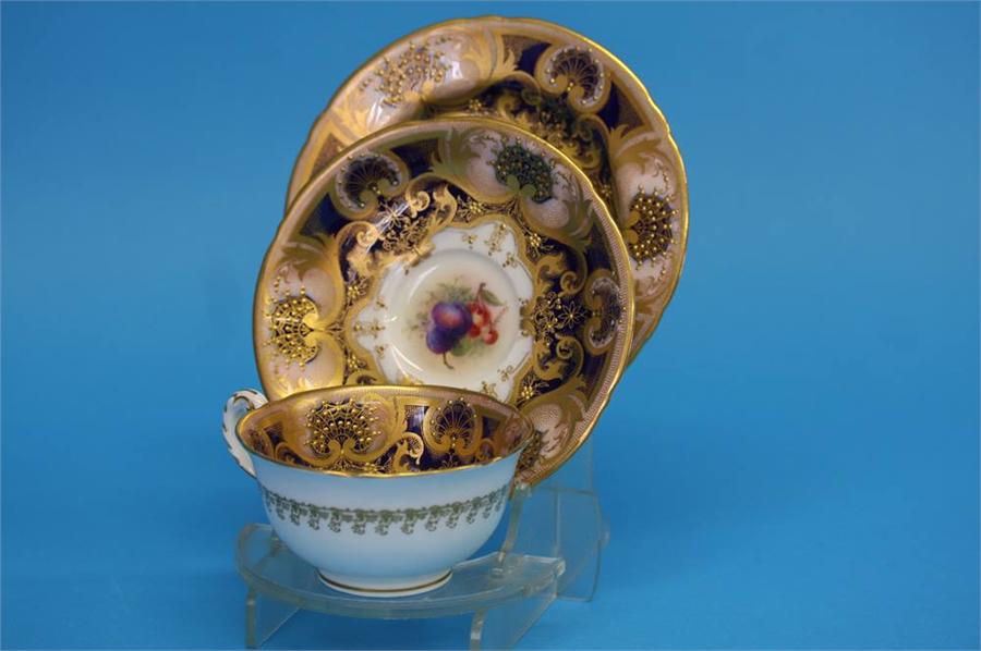 A Royal Worcester trio decorated by Jack Stanley painted with plums, cherries and apples with a - Image 7 of 35