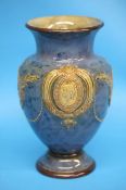 A Royal Doulton stoneware vase on a mottled blue ground, impressed mark, numbered 7114 and BB6,