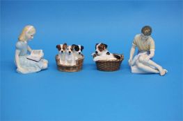 Two Royal Doulton figures 'Alice', HN 2158, 'Treasure Island', HN 2243 and two groups of dogs in
