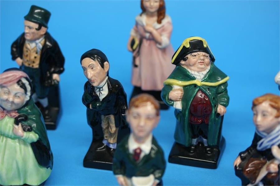 A Collection of sixteen Royal Doulton Charles Dickens figures including 'Scrooge', 'Bill Sikes', - Image 10 of 30
