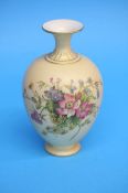 A Royal Worcester vase decorated with bouquets of flowers, green printed mark, numbered H302.  17 cm