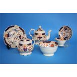 A Victorian gaudy Welch tea set comprising teapot, sucrier, slop bowl, two cake plates, twelve