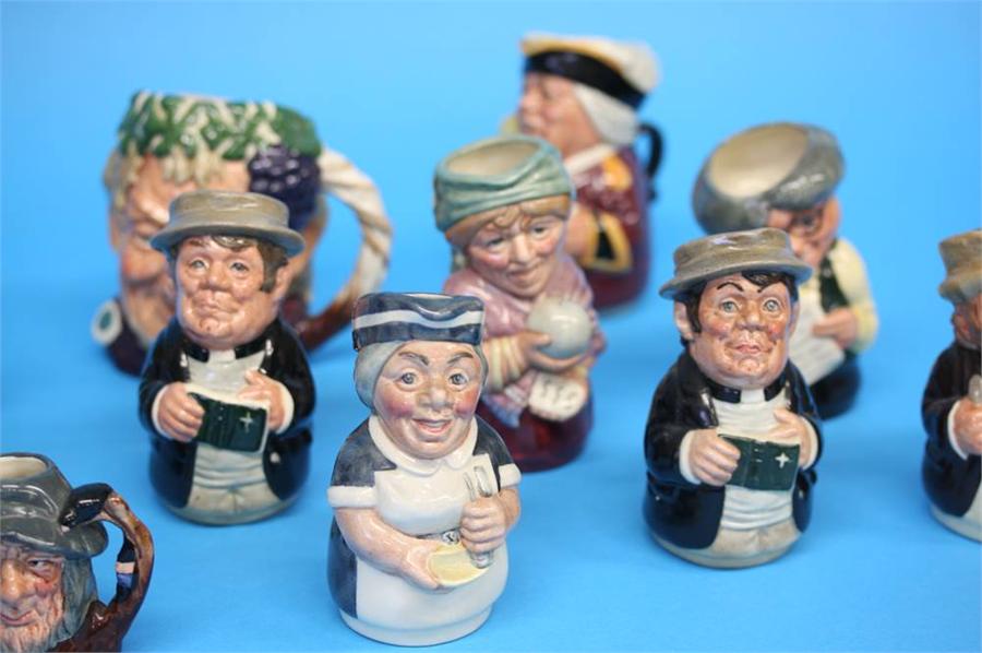 A Collection of nine Royal Doulton 'Doultonville' figures, four medium size Character jugs and - Image 11 of 30