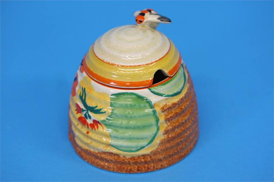 A Clarice Cliff Bizarre 'Nasturtium' pattern beehive shape honey pot and cover, black printed mark. - Image 14 of 21