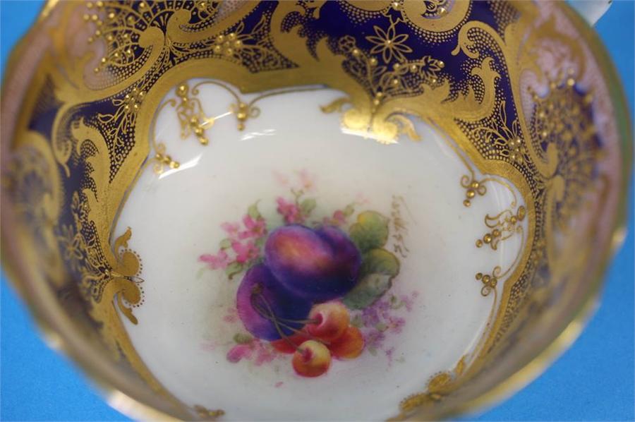 A Royal Worcester trio decorated by Jack Stanley painted with plums, cherries and apples with a - Image 14 of 35