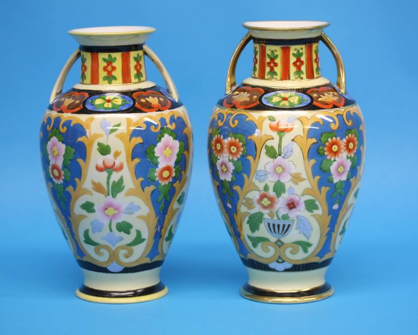 A pair of Noritake vases with gilt looped handles decorated with colourful flowers on a yellow and - Image 2 of 35