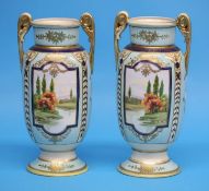 A pair of Noritake vases with gilt acanthus scrolled handles, each decorated with landscaped