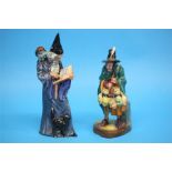 Two Royal Doulton figures 'The Wizard', HN 2877 and 'The Mask Seller', HN 2103. (2)