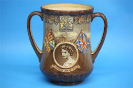 A Royal Doulton loving cup to commemorate 'The Coronation of Queen Elizabeth II at Westminster