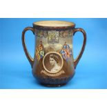 A Royal Doulton loving cup to commemorate 'The Coronation of Queen Elizabeth II at Westminster