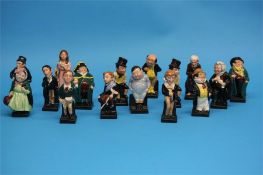 A Collection of sixteen Royal Doulton Charles Dickens figures including 'Scrooge', 'Bill Sikes',