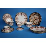 A part Royal Crown Derby tea set comprising; two cake plates, three side plates, three cups and