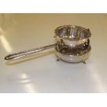 900 grade Greek Silver tea strainer with integral drip pan, 75 grams in weight.