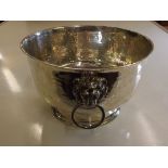 Large Edwardian Planished Silver Footed bowl, with twin lion mask drop ring handles, London 1910,