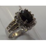 10ct white gold dress ring with black gemstone