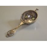 A Vintage Sterling Silver Tea Strainer, 13cm in length, 16 grams in weight.