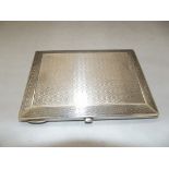 Silver art deco cigarette case with swag engine turned decoration, internal markings for Boodle &